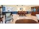 The living room has a dining area, lovely furniture, and elegant marble floors at 3461 Tallywood Cir # 7067, Sarasota, FL 34237