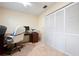 Bright and functional office space features large closet doors, and an office area at 3461 Tallywood Cir # 7067, Sarasota, FL 34237