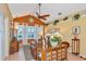 Inviting living room offers natural light, beamed ceilings, and comfortable furnishings perfect for relaxing at 3712 59Th Avenue E Cir, Ellenton, FL 34222