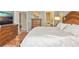 Spacious main bedroom with wood furniture, large bed, and ensuite bathroom access at 3712 59Th Avenue E Cir, Ellenton, FL 34222