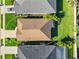 Birds-eye view of home showcasing roof, yard, and screened-in patio in a community at 3835 Autumn Fern Ter, Sarasota, FL 34243