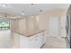 Open kitchen island overlooking the living area, perfect for entertaining guests at 3835 Autumn Fern Ter, Sarasota, FL 34243