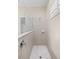 Walk-in shower featuring tile surround, glass divider, and neutral design elements offering a clean and modern feel at 3835 Autumn Fern Ter, Sarasota, FL 34243