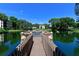 Beautiful waterfront view from the end of the dock on a community pond at 425 30Th W Ave # C201, Bradenton, FL 34205