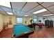 Active game room featuring billiards and exercise equipment for fun and fitness at 425 30Th W Ave # C201, Bradenton, FL 34205