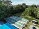 Aerial view of the well-maintained shuffleboard courts and seating areas in this community at 425 30Th W Ave # C201, Bradenton, FL 34205