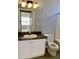 Bathroom with a single vanity, toilet, and combination bathtub and shower at 4802 51St W St # 1420, Bradenton, FL 34210