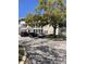 Three-story condo building with screened porches and parking for residents in a well-maintained community at 4802 51St W St # 1420, Bradenton, FL 34210