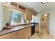 Well-lit kitchen with ample counter space and cabinetry at 508 67Th Avenue W Dr, Bradenton, FL 34207