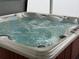 Inviting hot tub with bubbling water and comfortable design at 509 Stone Briar Dr, Ruskin, FL 33570