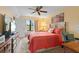 Cozy bedroom with a spacious layout, desk, and ample natural light at 515 30Th Ave W # H410, Bradenton, FL 34205
