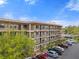 Condo exterior featuring multiple floors, balconies, and convenient parking at 515 30Th Ave W # H410, Bradenton, FL 34205