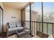 Relaxing screened porch with wicker furniture and views at 515 30Th Ave W # H410, Bradenton, FL 34205