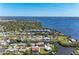 Beautiful aerial view of waterfront homes, canals, and lush greenery in a coastal community at 515 Leffingwell Ave # 210, Ellenton, FL 34222
