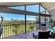 Spacious balcony overlooking lush landscaping and beautiful waterfront view at 515 Leffingwell Ave # 210, Ellenton, FL 34222