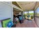 Serene balcony with comfortable seating, scenic views and seamless indoor-outdoor flow at 515 Leffingwell Ave # 210, Ellenton, FL 34222
