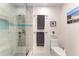 Modern bathroom features a glass shower with stone flooring and tiled walls at 515 Leffingwell Ave # 210, Ellenton, FL 34222