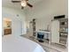 Light-filled bedroom with desk and shelf space, and entryways to other rooms at 515 Leffingwell Ave # 210, Ellenton, FL 34222