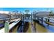 View of a boat lift showcasing waterfront living; a boater's paradise at 515 Leffingwell Ave # 210, Ellenton, FL 34222