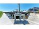View of a dock area featuring a fish cleaning table and waterfront property at 515 Leffingwell Ave # 210, Ellenton, FL 34222