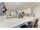 Updated kitchen features marble countertops and stainless steel appliances at 515 Leffingwell Ave # 210, Ellenton, FL 34222