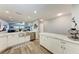 Modern kitchen with open layout, stainless steel sink and marble counters at 515 Leffingwell Ave # 210, Ellenton, FL 34222