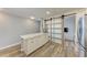 Kitchen island with marble counters and access to the laundry room at 515 Leffingwell Ave # 210, Ellenton, FL 34222