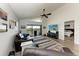 Cozy living room featuring modern furniture, a TV, and access to a balcony at 515 Leffingwell Ave # 210, Ellenton, FL 34222