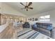 Bright living room with dining area and open access to the modern kitchen at 515 Leffingwell Ave # 210, Ellenton, FL 34222