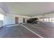 Assigned parking spot in a well-lit parking garage with easy access and security features at 515 Leffingwell Ave # 210, Ellenton, FL 34222