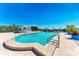 Waterfront pool offers scenic views of the canal and boat docks creating a perfect oasis for relaxation and entertainment at 515 Leffingwell Ave # 210, Ellenton, FL 34222