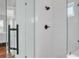 New bathroom with glass shower enclosure, black shower head, and white subway tile at 5211 Mahogany Run Ave # 126, Sarasota, FL 34241