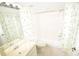 Clean bathroom featuring a tub-shower combination, a toilet, and a vanity sink at 5684 Sheffield Greene Cir # 79, Sarasota, FL 34235