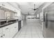 Bright and spacious kitchen featuring modern appliances and open design with a view to other rooms at 5814 Garden Lakes Fern, Bradenton, FL 34203