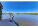 Waterfront home featuring a private dock and direct access to beautiful calm water views at 603 Ravenna N St, Nokomis, FL 34275