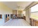 Room to remodel with a large area featuring tile flooring, lots of windows, and outdoor access at 603 Ravenna N St, Nokomis, FL 34275