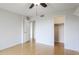 Bedroom features a closet, wood floors, and white trim at 6124 43Rd W St # 404A, Bradenton, FL 34210