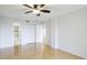 Large bedroom with ensuite bathroom access and wood flooring at 6124 43Rd W St # 404A, Bradenton, FL 34210