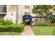 Welcoming entrance featuring well-maintained landscaping and a covered entryway at 6124 43Rd W St # 404A, Bradenton, FL 34210