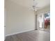 Bright bedroom with sliding door access and a serene outdoor view at 6766 Greenview Ln, Englewood, FL 34224