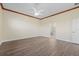 Bright bedroom featuring smooth floors and an ensuite bathroom at 6766 Greenview Ln, Englewood, FL 34224
