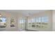 Open living space with sliding glass doors providing seamless indoor/outdoor living at 6766 Greenview Ln, Englewood, FL 34224