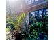 Lush greenery surrounds the exterior of the home at 7183 Wood Creek Dr # 9, Sarasota, FL 34231