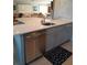 Bright kitchen featuring modern countertops and stainless steel appliances at 7183 Wood Creek Dr # 9, Sarasota, FL 34231