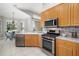 Well-equipped kitchen with modern appliances and breakfast nook with bright natural lighting at 7351 Meeting St, Bradenton, FL 34201