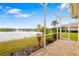 Screened-in lanai with beautiful lake views, perfect for outdoor living and entertaining at 7351 Meeting St, Bradenton, FL 34201