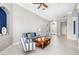 Cozy living room with neutral walls, tile floors, and comfortable furnishings at 7351 Meeting St, Bradenton, FL 34201