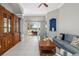 Comfortable living room showcasing a built-in cabinet and sliding glass doors to the patio at 7351 Meeting St, Bradenton, FL 34201