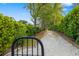 Well-maintained walking path surrounded by manicured greenery at 7351 Meeting St, Bradenton, FL 34201