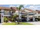 Inviting townhouse with covered parking, manicured landscaping, and a welcoming residential setting at 756 Avenida Estancia # 162, Venice, FL 34292